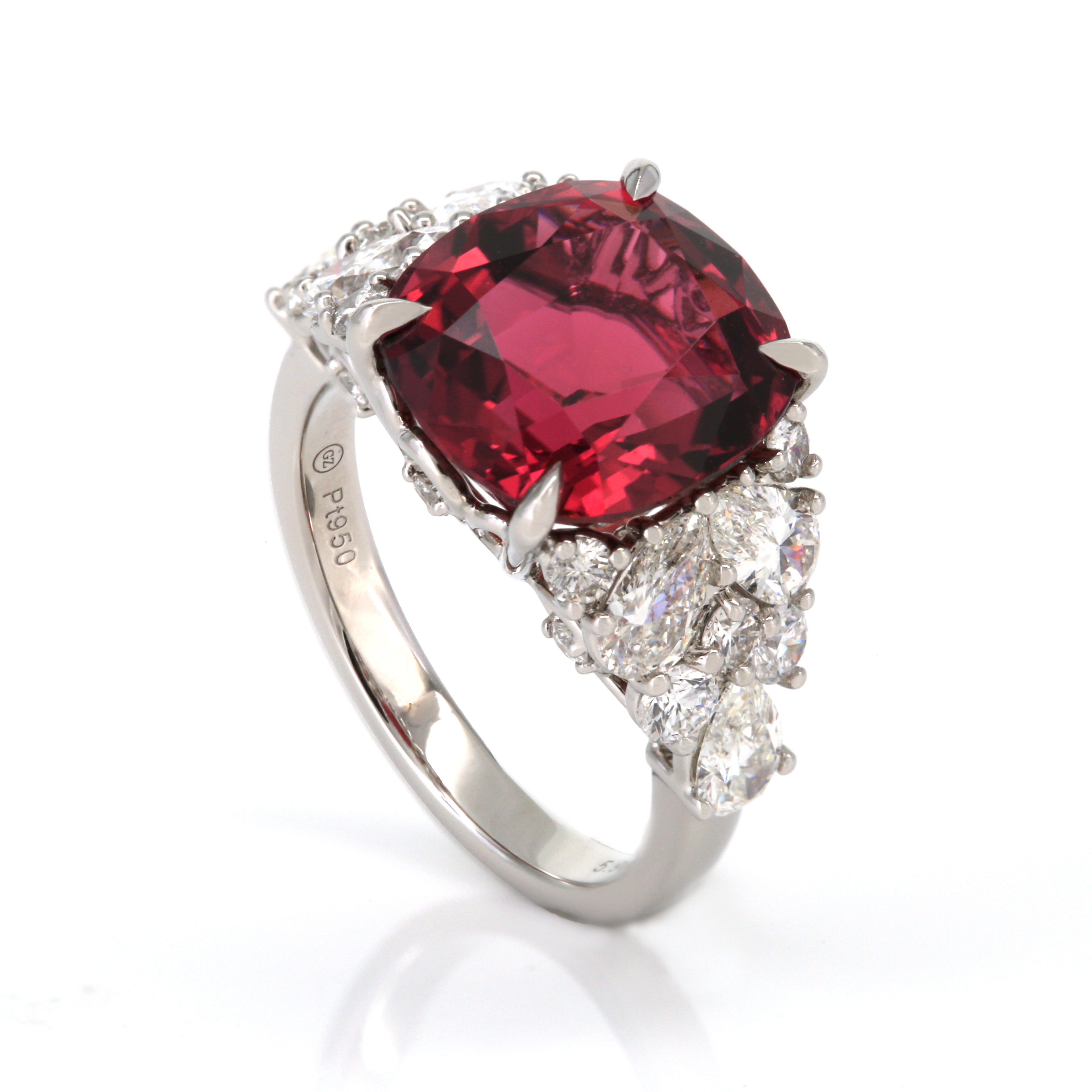 Angled perspective of tourmaline and diamond ring in PT950 platinum