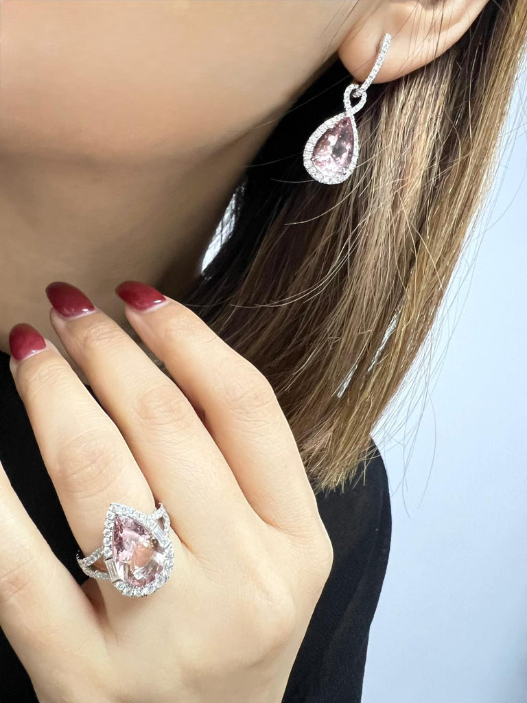 On the hand, 3.52ct morganite and diamond halo ring in platinum PT950