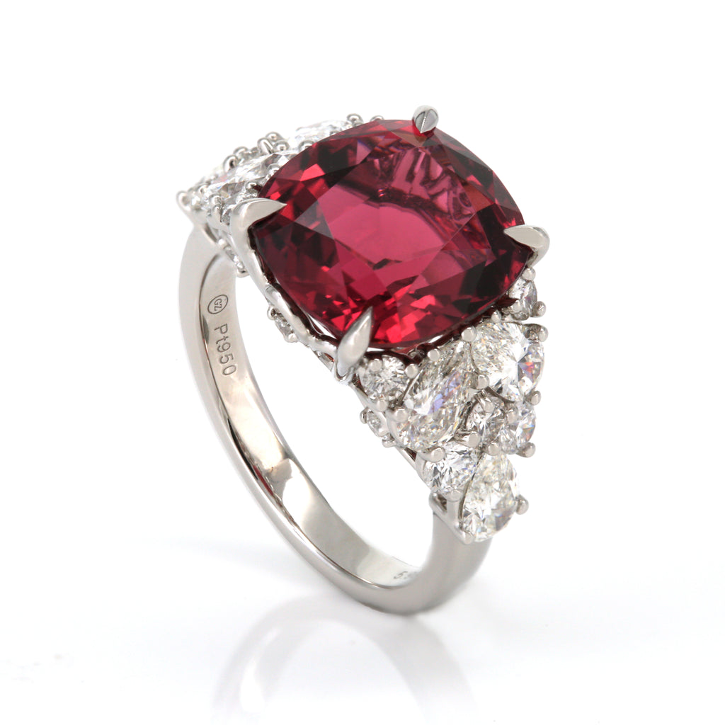 Angled perspective of tourmaline and diamond ring in PT950 platinum