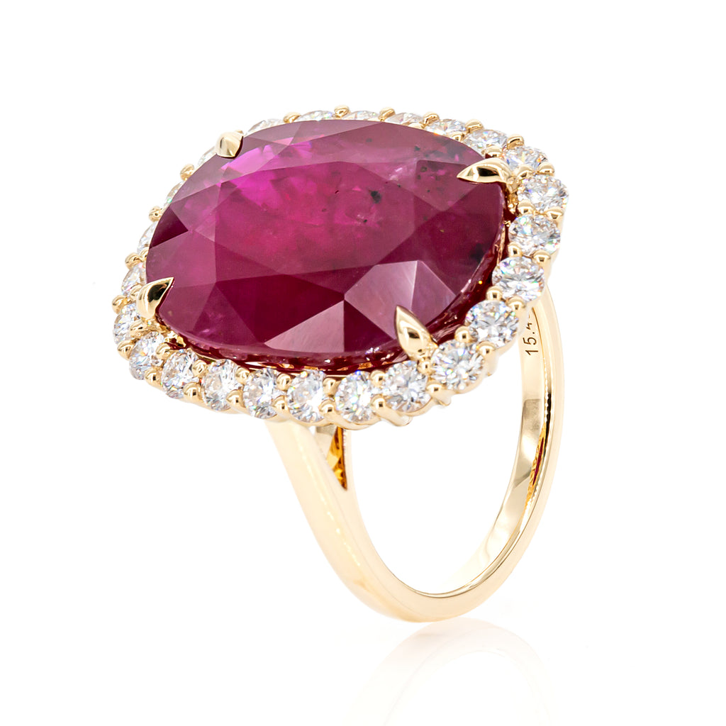 “15.45-carat intense purplish-red oval ruby diamond ring set in 18K yellow gold with IGI certification, featuring a halo of brilliant natural diamonds.”