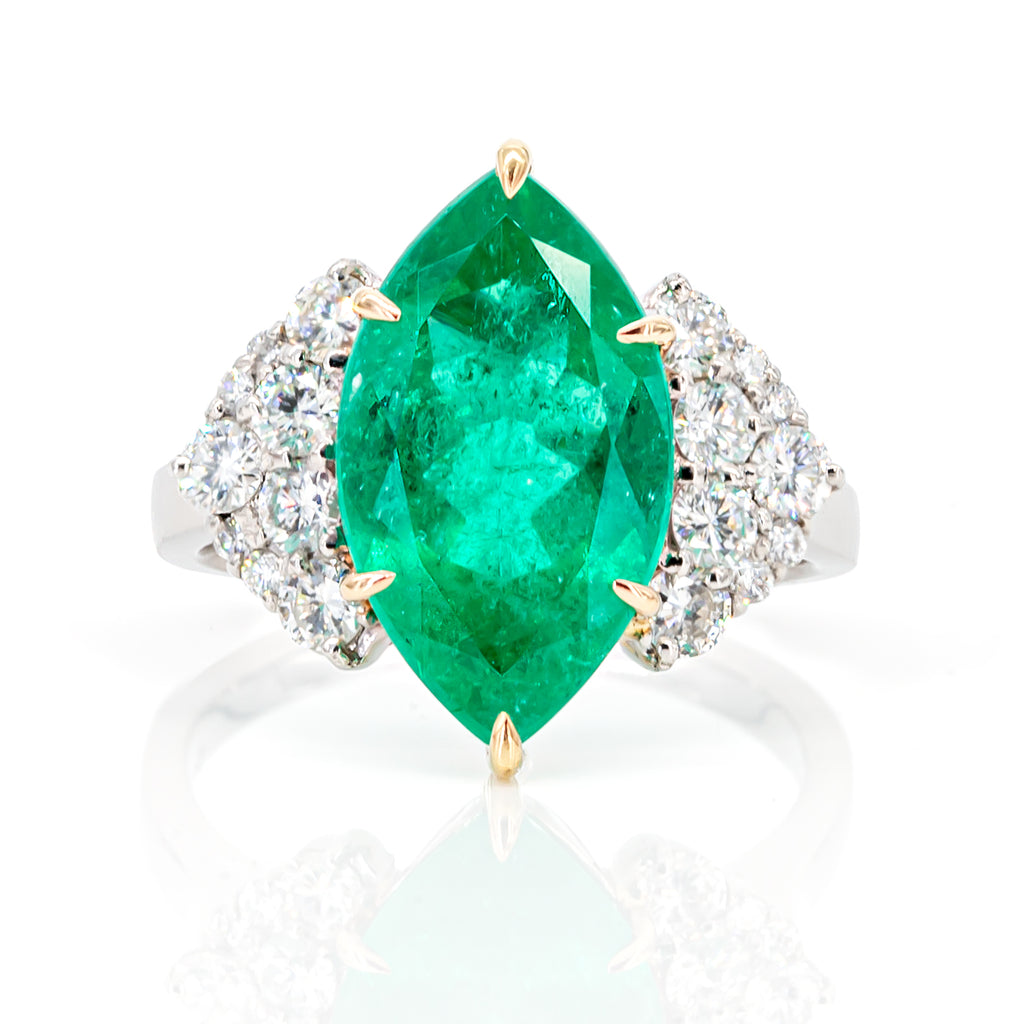Top view of 4.03ct Colombian emerald and diamond ring in PT900 platinum and 18K yellow gold