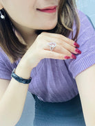 On the hand, 3.52ct morganite and diamond halo ring in platinum PT950