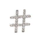 Silver hashtag charm with clear stones on a white background