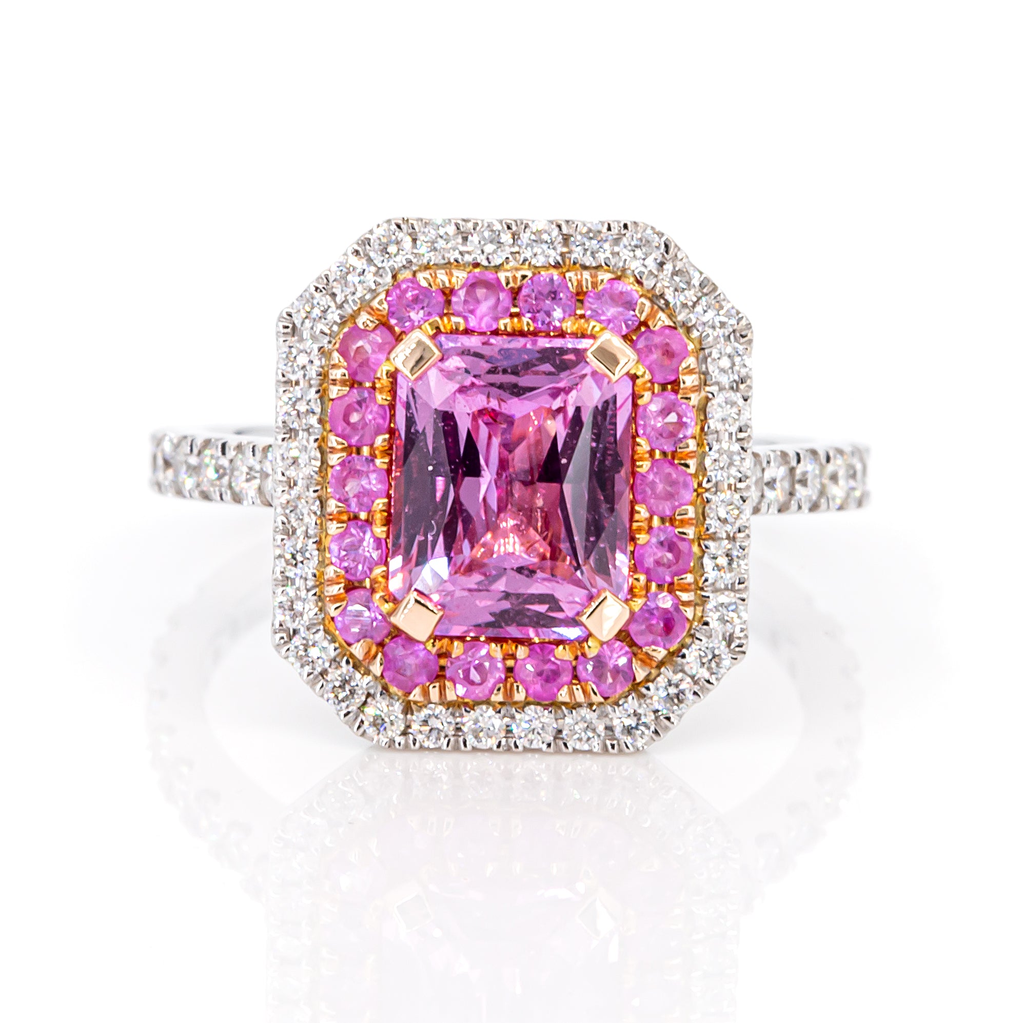 Top view of 2.05ct pink sapphire surrounded by brilliant diamonds in a halo design