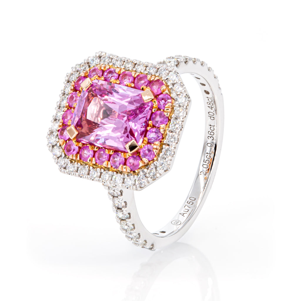 Close-up of vibrant 2.05ct pink sapphire gemstone with diamond accents