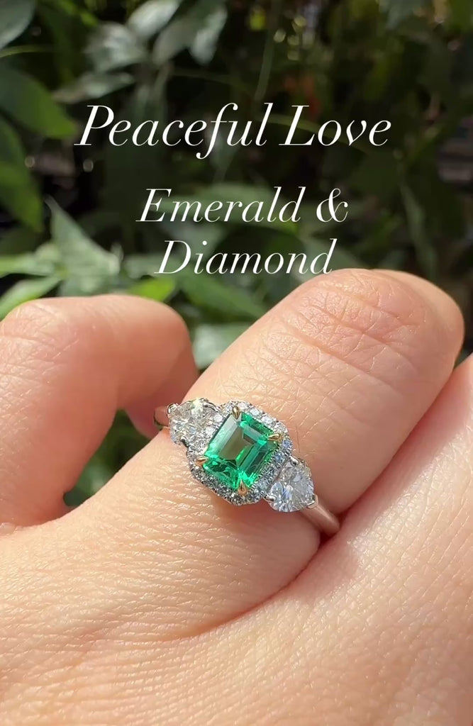 Close-up video of 0.49ct emerald-cut diamond with platinum prongs and yellow gold band